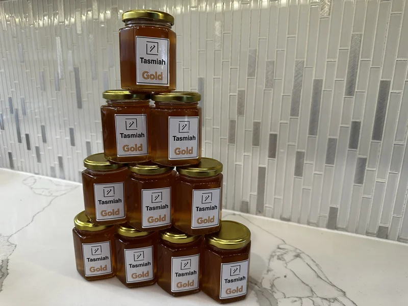 Stack of multiple Tasmiah honey jars